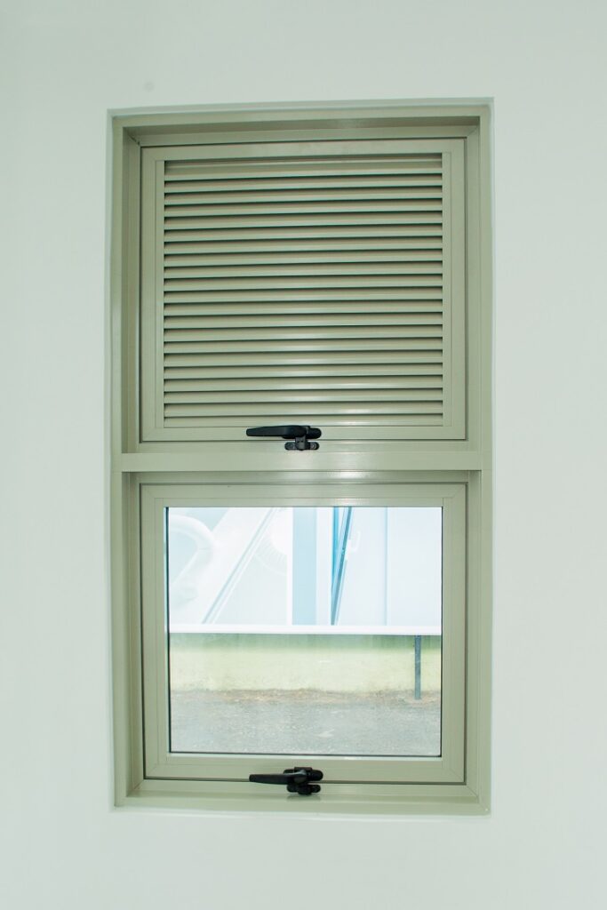 C Groove Casement window with louvre